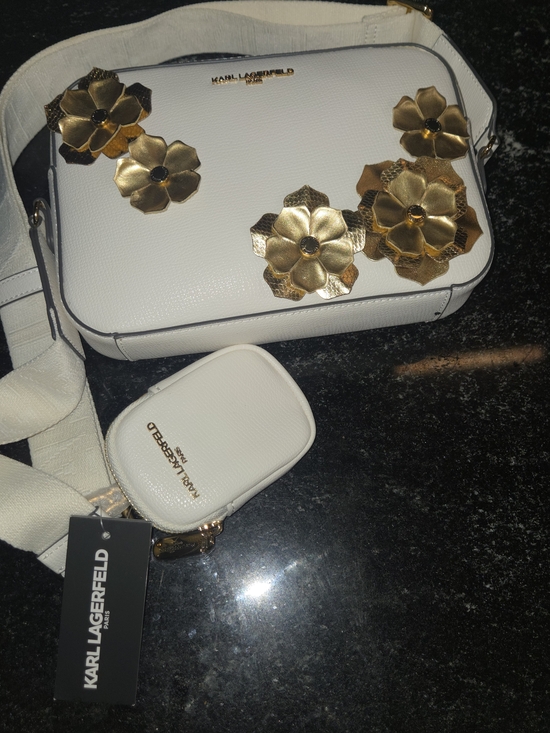 Karl Lagerfeld Handbags - Karl Lagerfeld White Crossbody Bag with Gold Floral Accents